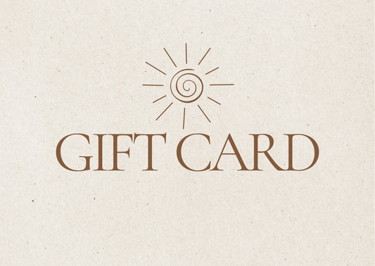 Gift card design with sunburst symbol and 'GIFT CARD' text on beige background